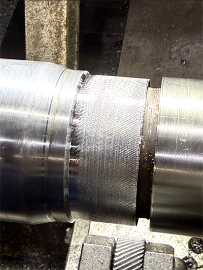 Eroded shaft surface with loss of geometry before Belzona 1161 application.