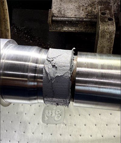 Curing stage of Belzona 1161 rebuild on shaft prior to final machining.