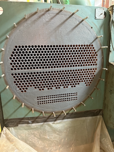 Rebuilt and coated tube sheet with Belzona 1121 and 1321 after repair.
