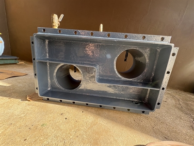 Rebuilt water box interior with completed Belzona coating system.