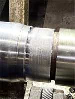 Eroded shaft surface with loss of geometry before Belzona 1161 application.