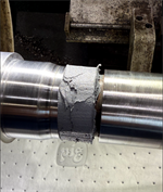 Curing stage of Belzona 1161 rebuild on shaft prior to final machining.