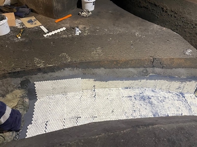 As the Belzona 1321 was left to cure overnight and the 6-hour overcoat window was exceeded, the surface was frost-blasted the following morning.