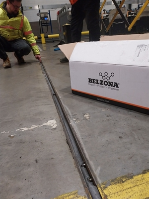 Exposed joint on a concrete floor of a distribution facility
