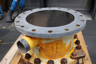 A damaged spool on a crate