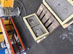The two sections of the steel header box arrive on a pallet